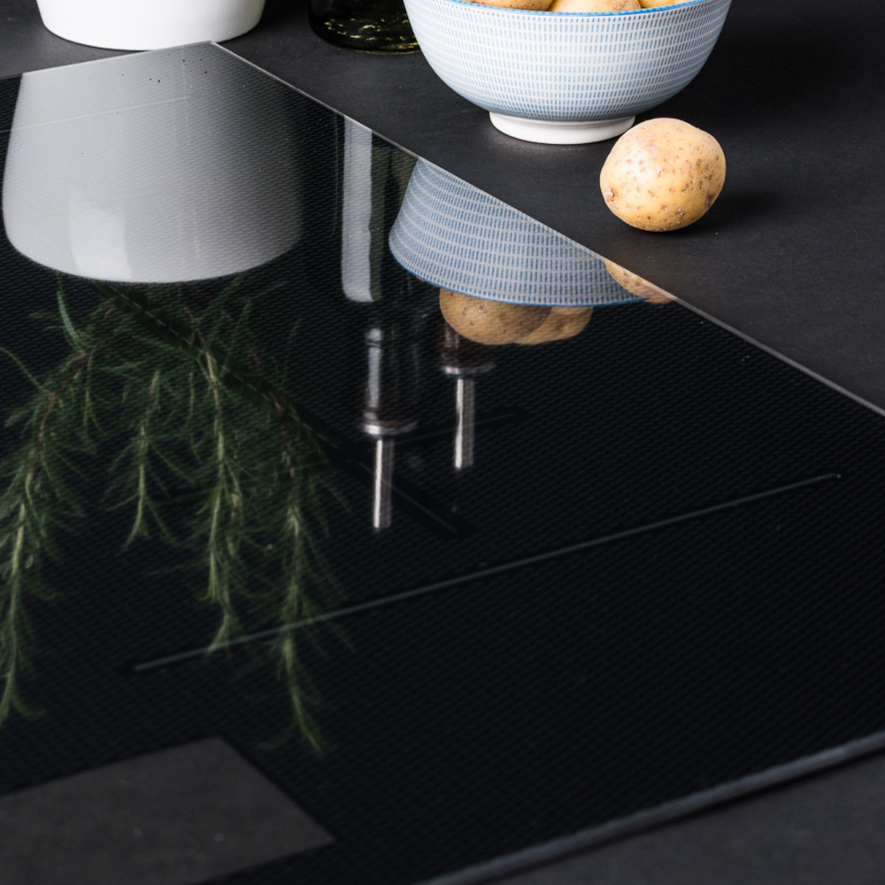 FotoDe glaskeramische kookplaat voor de keuken van de toekomst